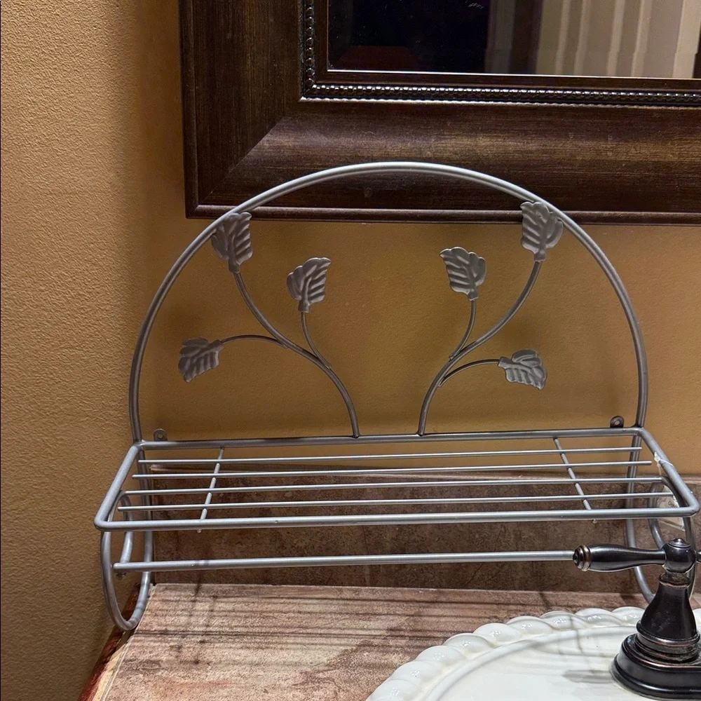 Elegant Gray Metal Wall Shelf with Leaf Design